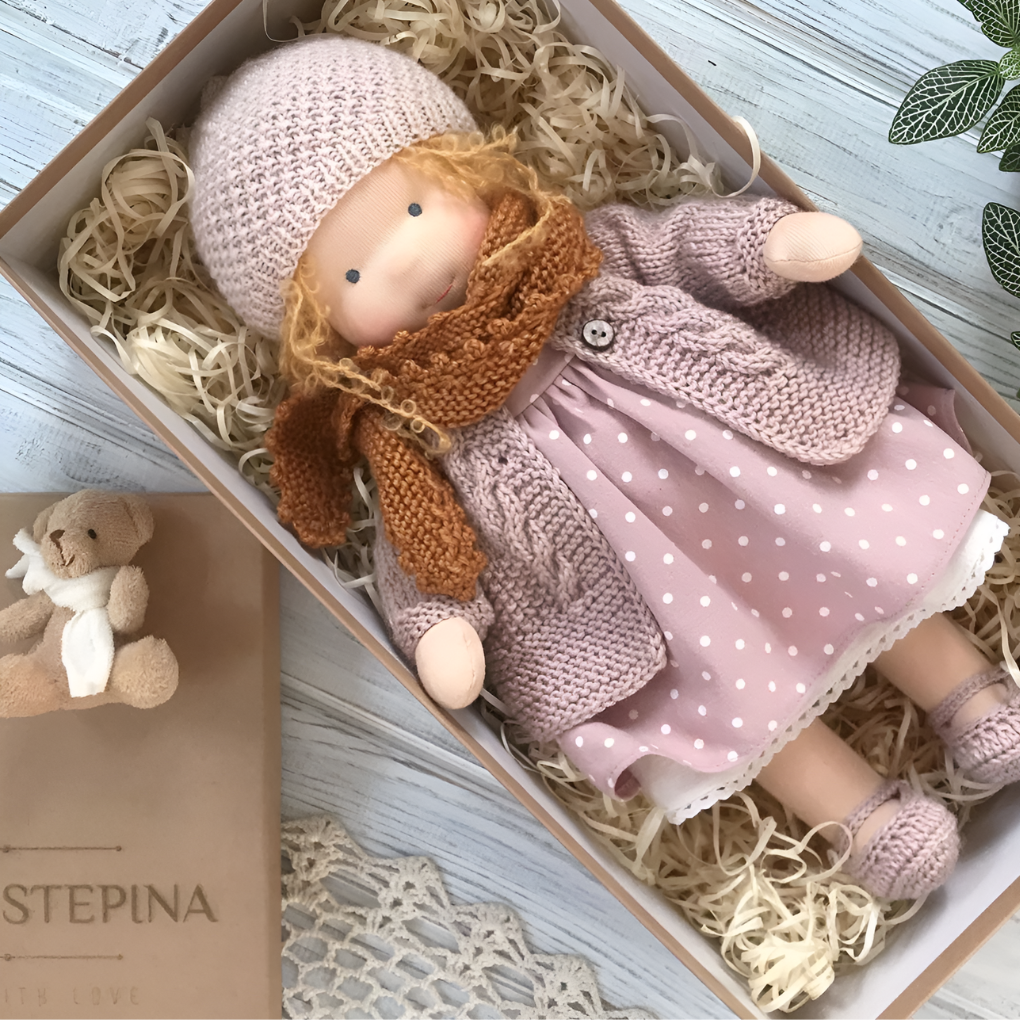 Classic Waldorf doll, soft & cuddly, a timeless natural toy for imaginative children.