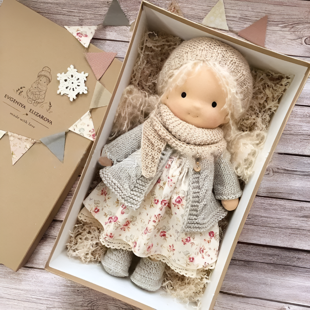 Handcrafted natural Waldorf doll, a cuddly wool-cotton friend for imaginative play.