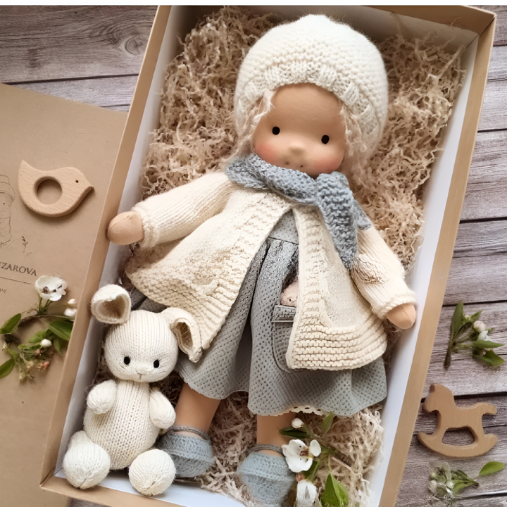 Minimalist Waldorf doll, soft & natural, perfect for encouraging imaginative play.