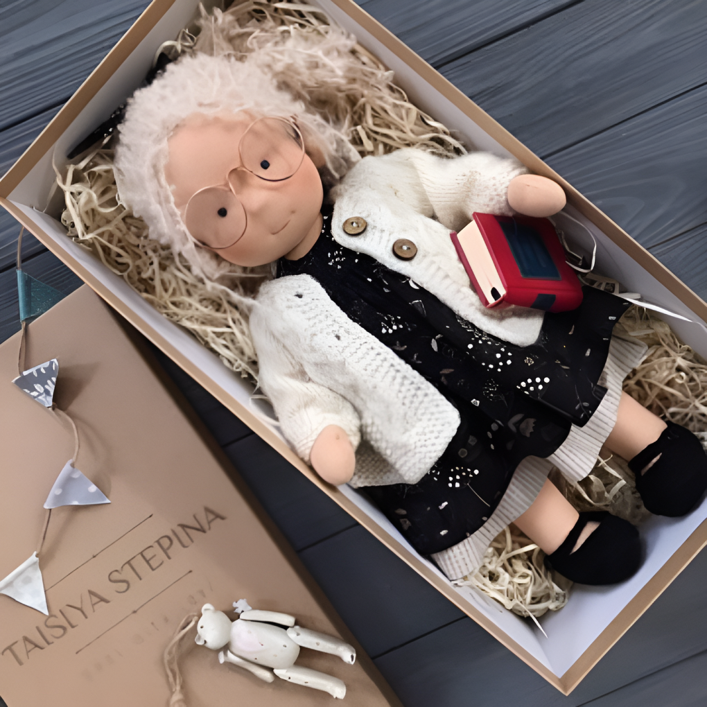 Soft Waldorf doll for imaginative play, made from natural wool & cotton.