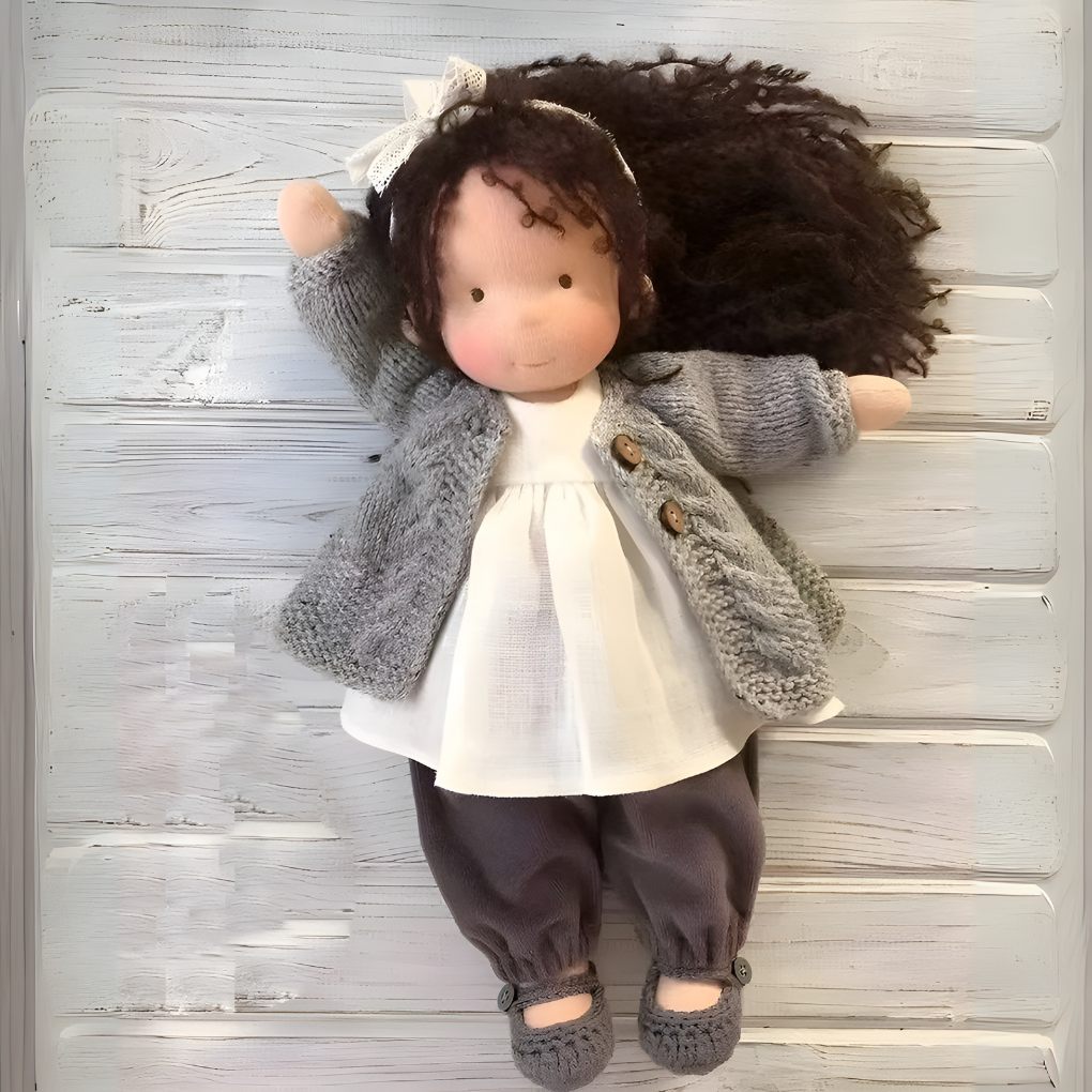 Beloved Waldorf doll, handcrafted, natural & soft for children's imaginative play.