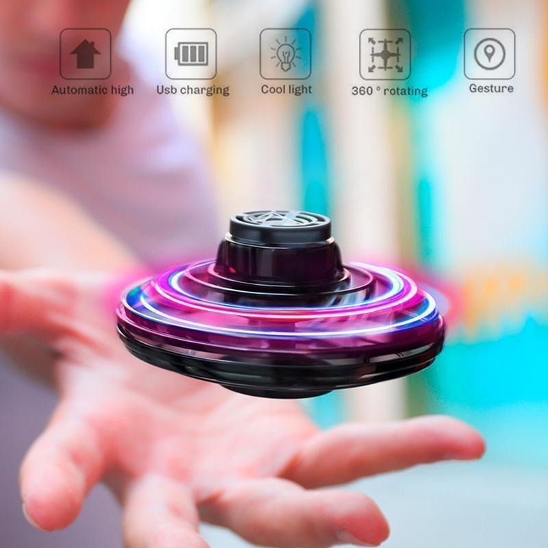 Kids' interactive mini flying drone toy with LED lights, USB rechargeable for outdoor fun.