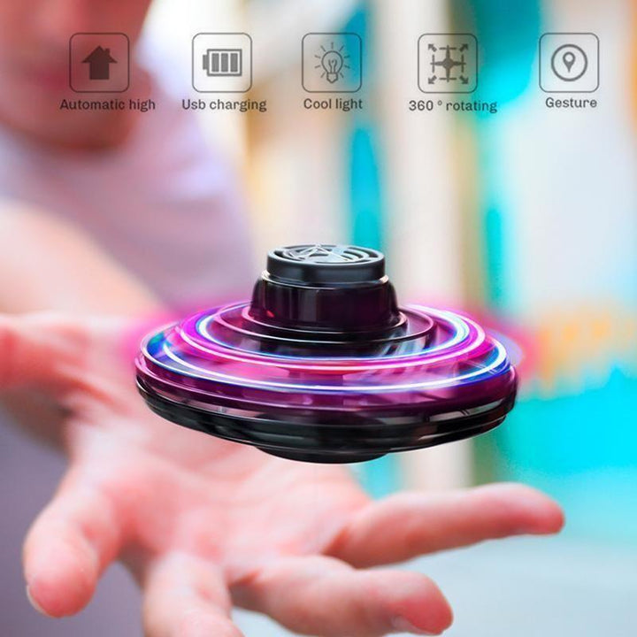 Kids' interactive mini flying drone toy with LED lights, USB rechargeable for outdoor fun.