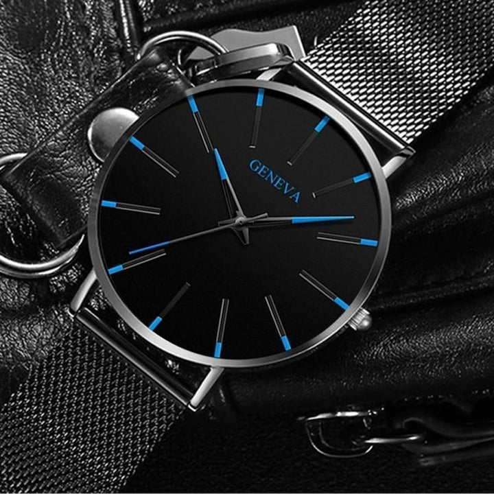 Modern elegant men's watch, black leather strap, minimalist dial with bold blue accents, perfect for daily wear.