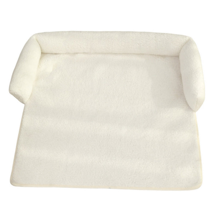 Pink non-slip dog blanket with ergonomic neck pillow, providing cozy comfort for cats and small dogs.