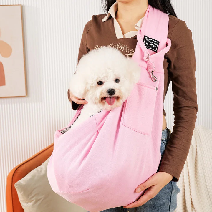 Outdoor pet sling carrier with adjustable strap, a travel bag designed for small dogs & cats. Breathable & secure.