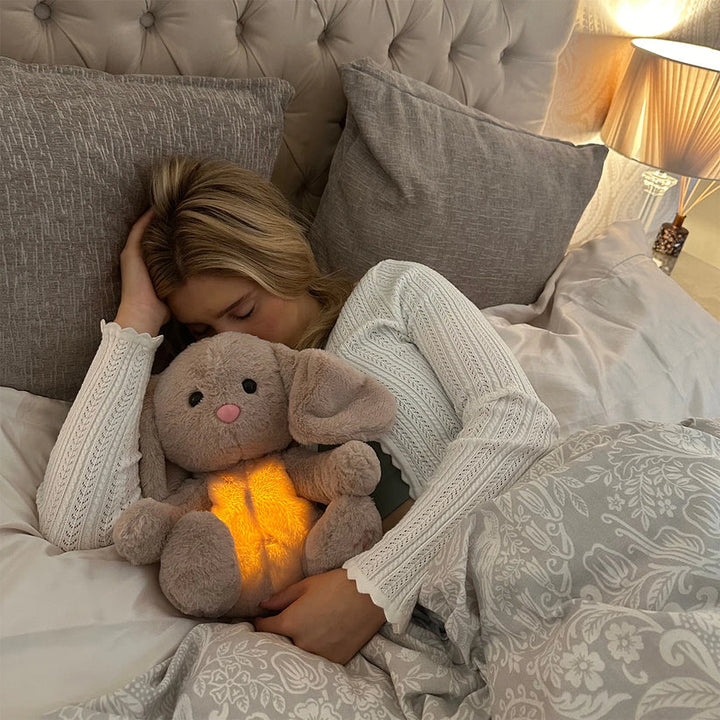 Kids' soothing plush animal toy with gentle light. A soft, huggable comfort companion & bedtime friend.