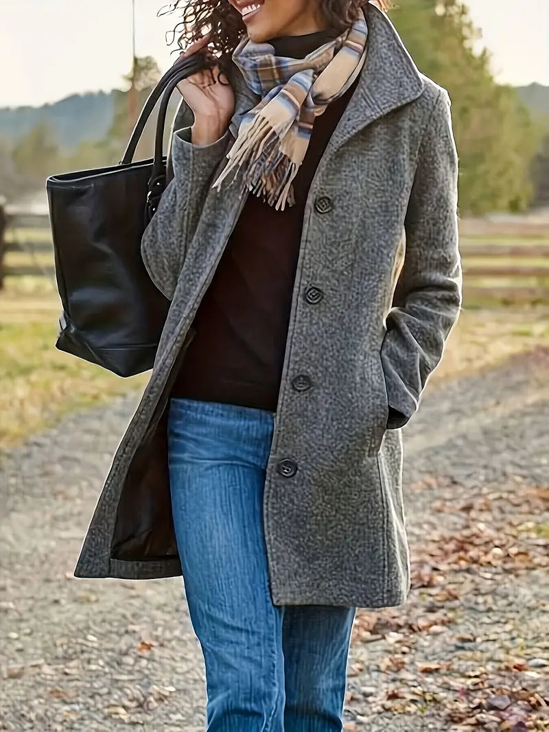 Tailored women's trench coat, timeless design with a sophisticated lapel, button-front, ideal for fall/winter fashion.