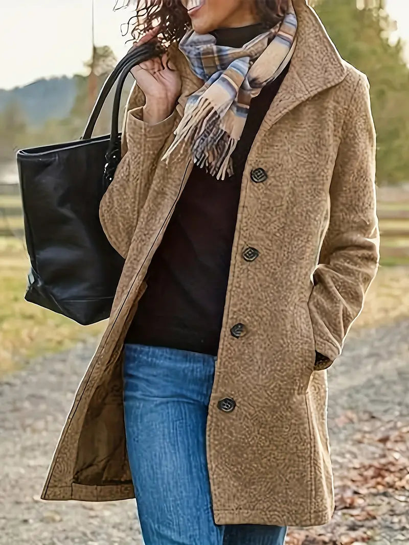Elegant women's tailored coat, mid-length and classic, featuring a stylish lapel and secure button-front for outerwear.