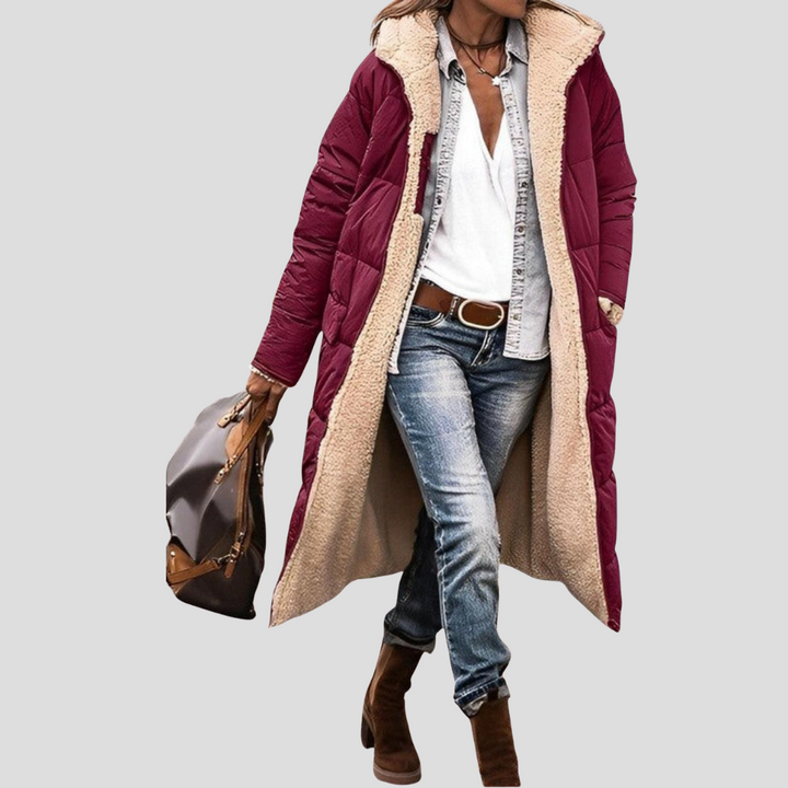 Cozy women's long hooded winter coat, designed for ultimate warmth & comfort. Reversible stylish outerwear.