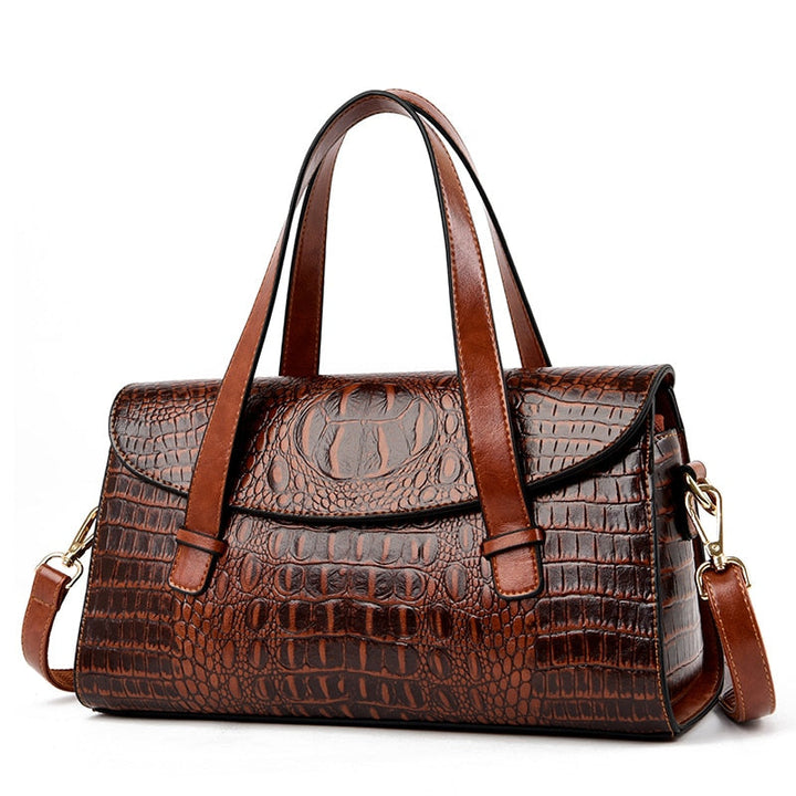 New women's elegant shoulder bag featuring sophisticated crocodile print. A trendy and versatile handbag.