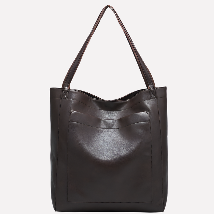 Versatile women's tote bag with adjustable shoulder strap. Can be worn as a shoulder bag, cross-body, or elegant handbag.