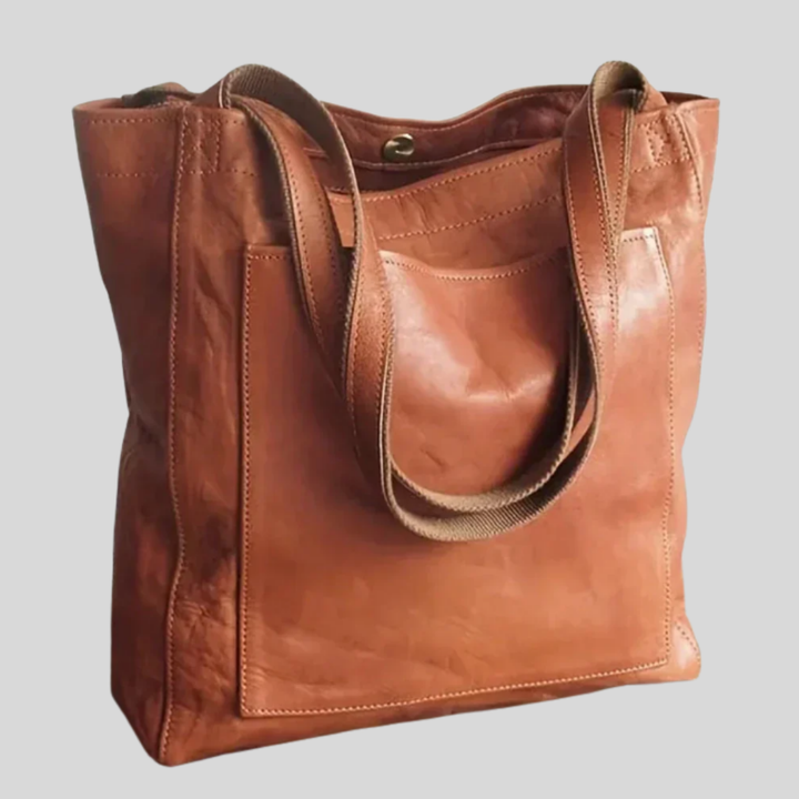 Elegant women's tote bag with adjustable shoulder strap, perfect for everyday or cross-body wear.