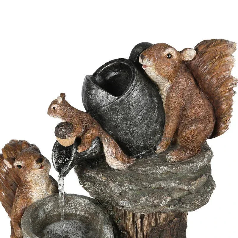 Decorative solar duck & squirrel garden fountain with LED light. Weatherproof resin statue enhances outdoor living & pond areas.