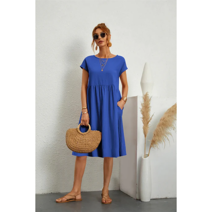 Everyday women's A-line midi dress with cap sleeves, round neck & pockets, comfortable summer fashion.