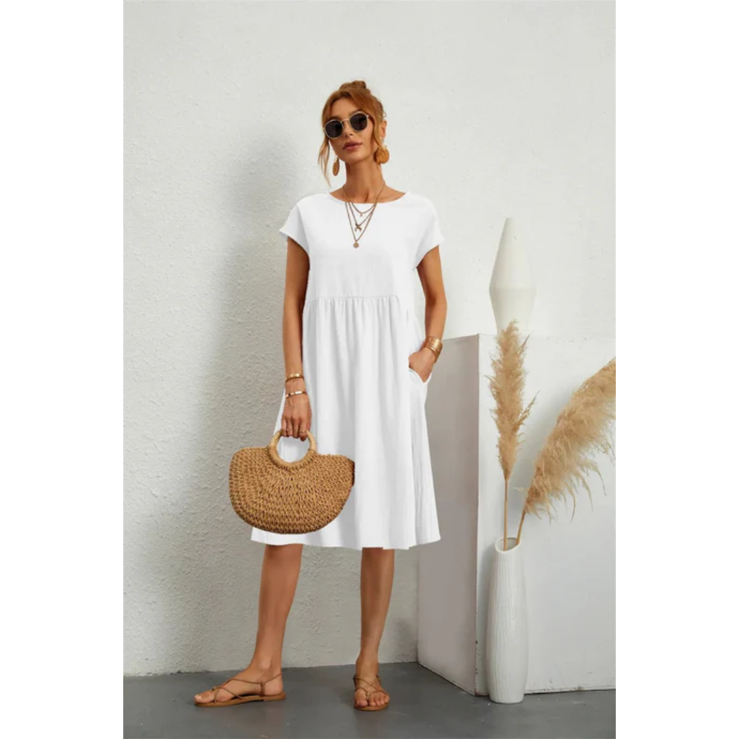 Women's chic cap sleeve A-line midi dress, comfortable with pockets, perfect for elegant summer days.