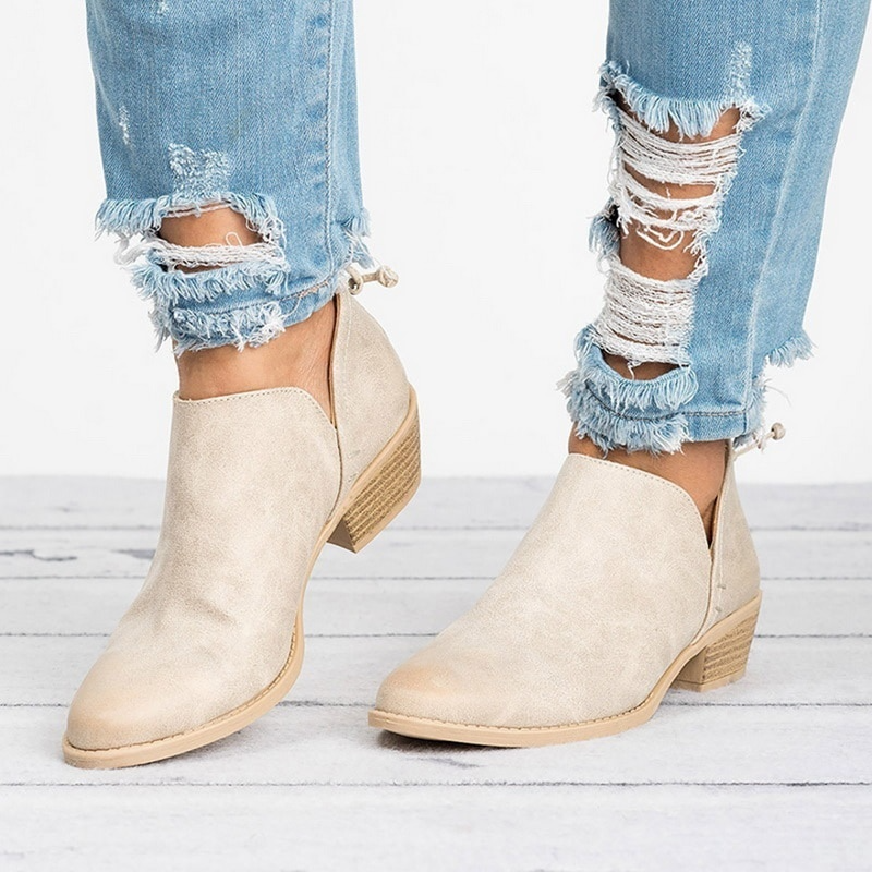 Chic women's ankle boots with low block heel & convenient back zip closure, perfect for versatile everyday fashion.