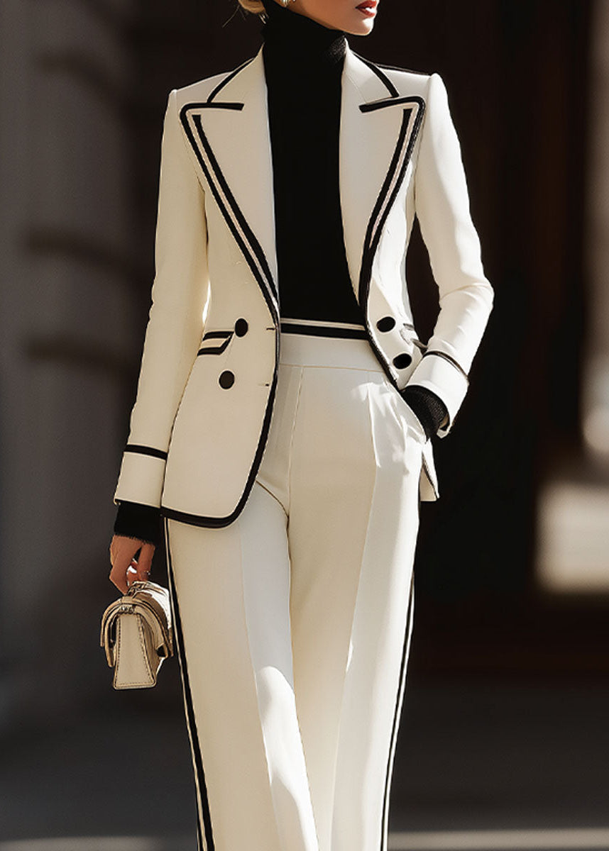 Professional women's suit set: double-breasted blazer & wide-leg pants. Modern office fashion with contrast details.