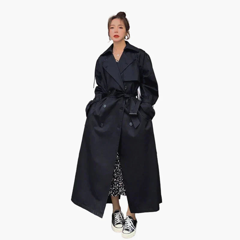 Versatile women's oversized long trench coat, providing a chic and relaxed fit for autumn or spring fashion.