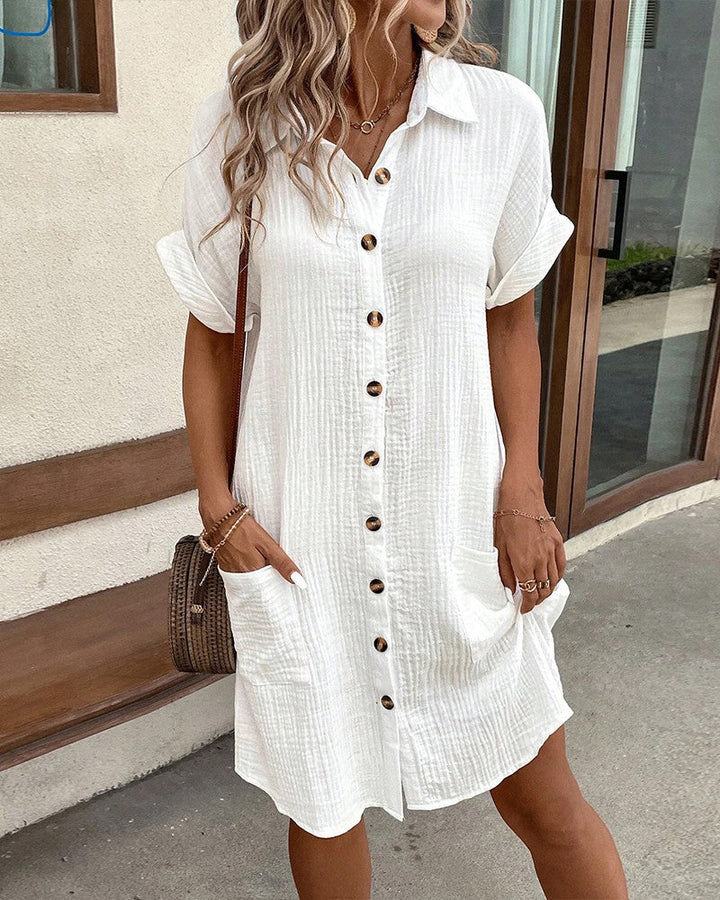 Chic women's polo dress with short sleeves & collar, perfect for summer casual wear. Relaxed fit, above knee.