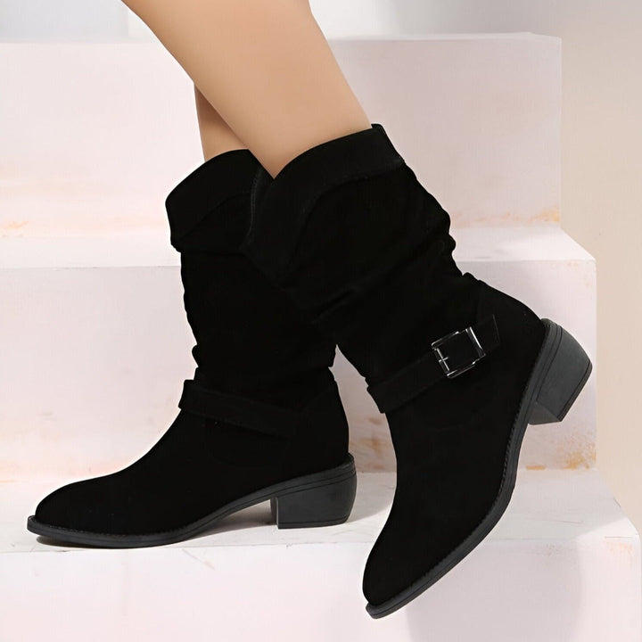 Cozy women's slouchy ankle boots with a low heel & buckle, offering comfortable & chic winter fall style.