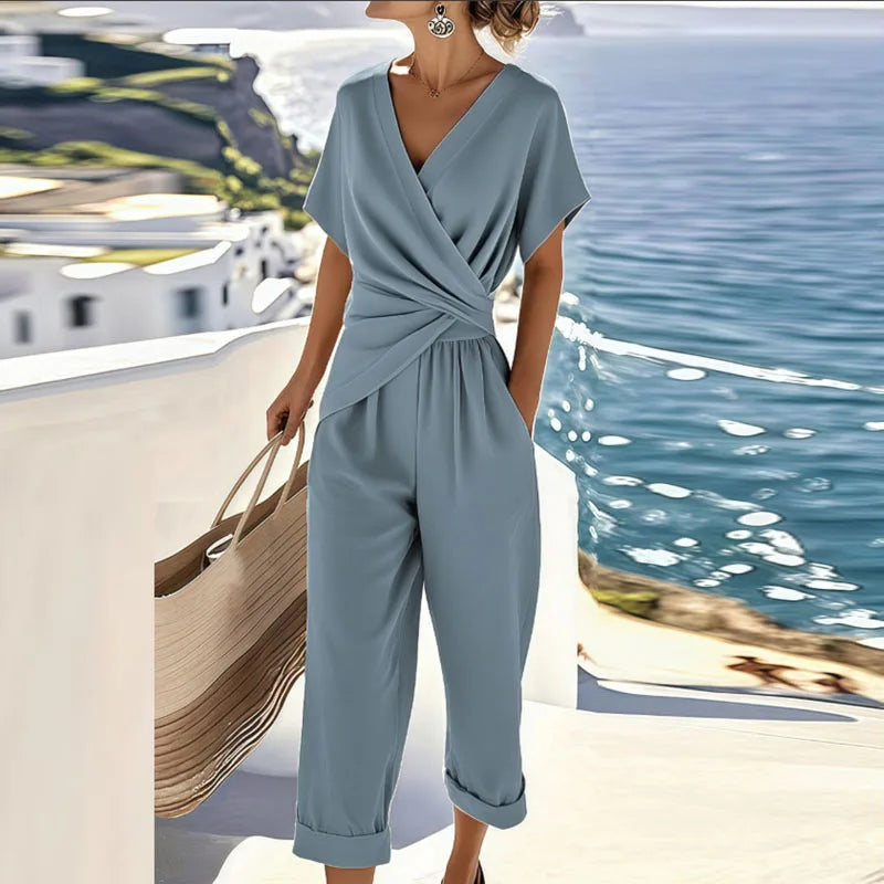 Stylish women's summer two-piece pants set featuring a flattering wrap top and comfortable cropped pants.