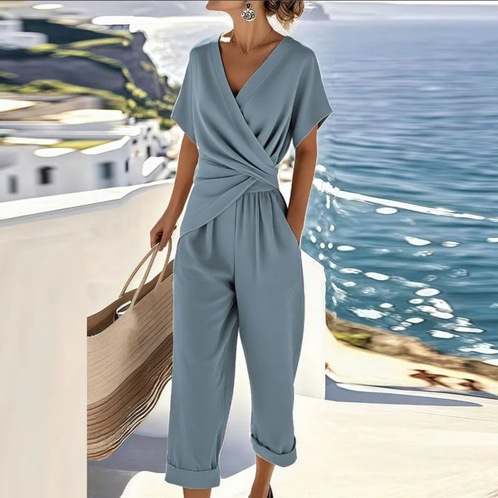 Stylish women's summer two-piece pants set featuring a flattering wrap top and comfortable cropped pants.