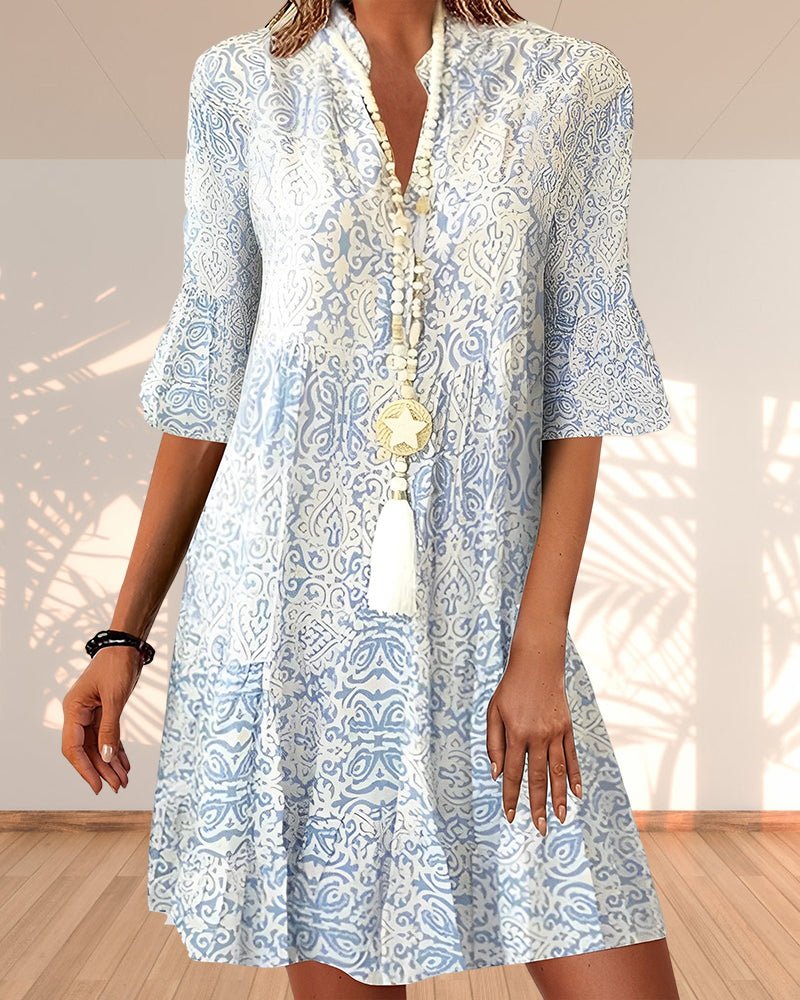 Chic women's V-neck A-line mini dress, perfect for spring fashion. Effortless casual style.