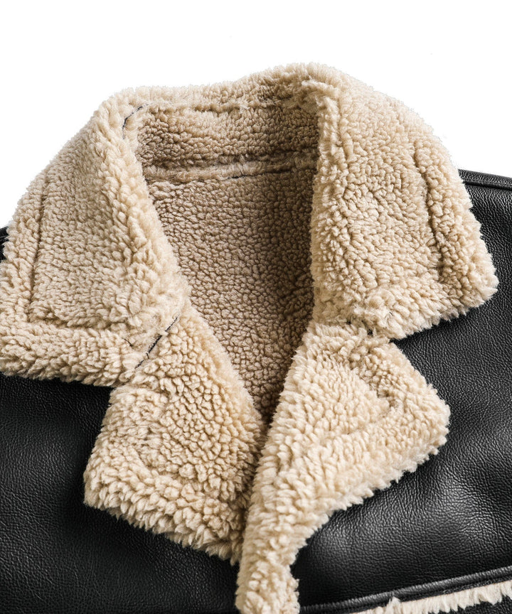 Warm black aviator jacket with cozy faux shearling detail, ideal unisex outerwear for winter.