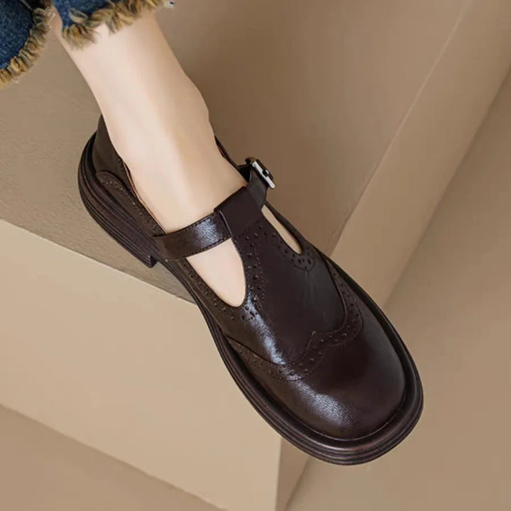 Elegant leather T-strap Mary Jane shoes in black, showcasing a timeless vintage footwear style