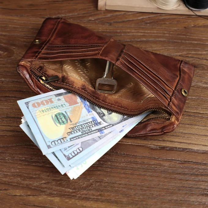 Distressed look full-grain leather wallet for men, dark brown, with secure snap closure.