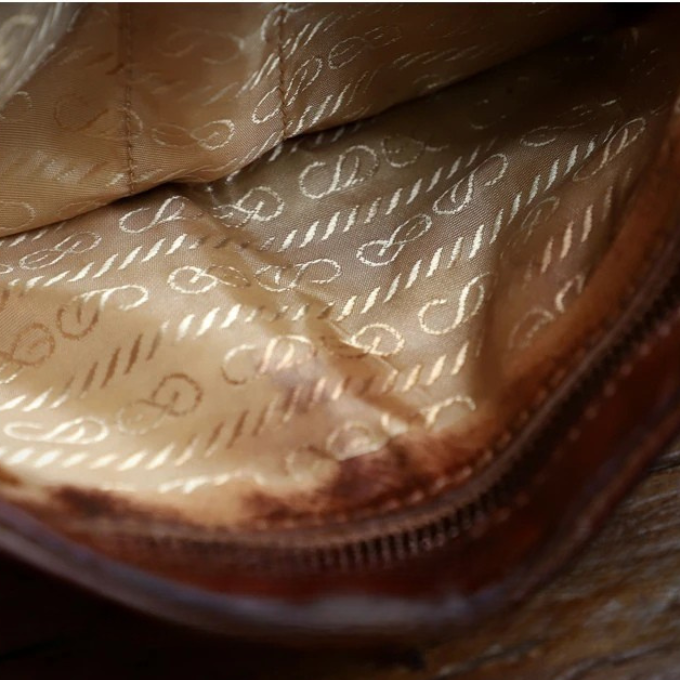 Front view of a brown full-grain leather men's wallet, perfect rugged accessory.