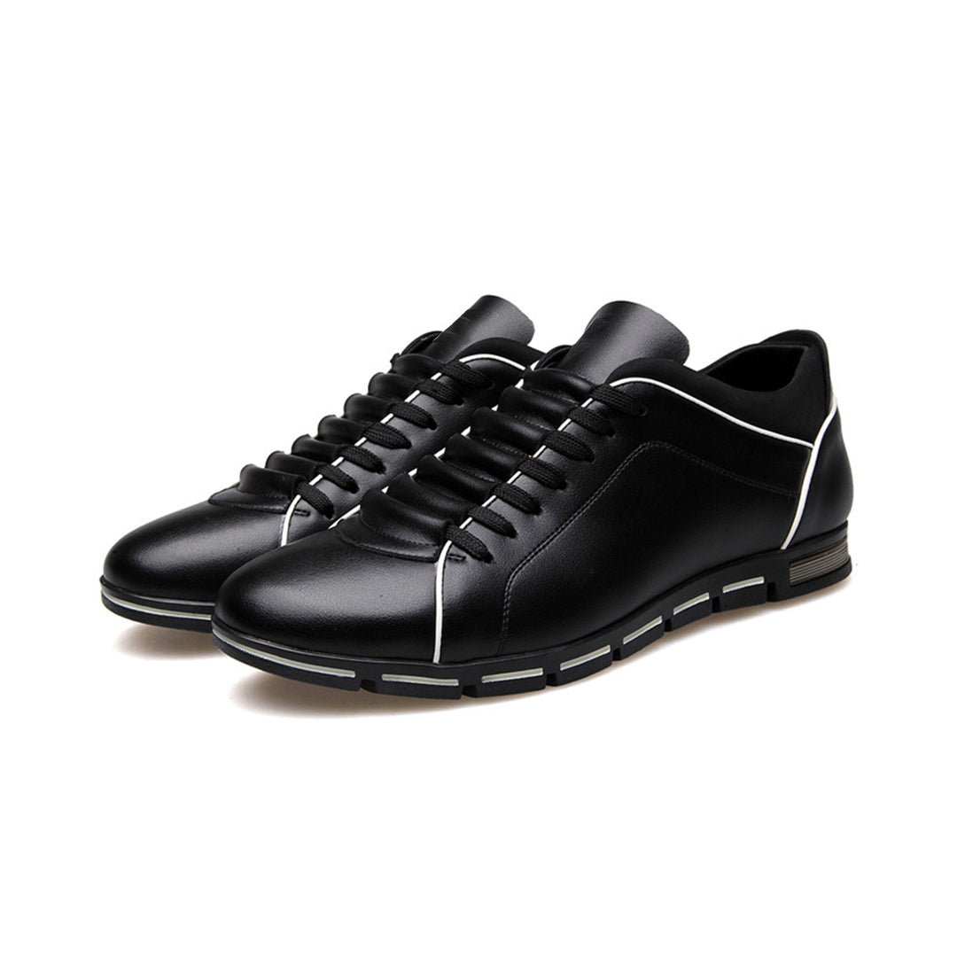 Stylish low-top men's sneakers in gray, a versatile classic for comfortable everyday fashion.