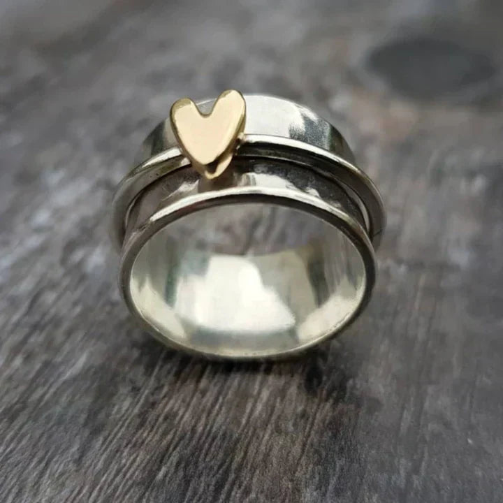 Classic silver heart dangle ring for women. Elegant fashion jewelry, perfect for everyday wear or a special gift.