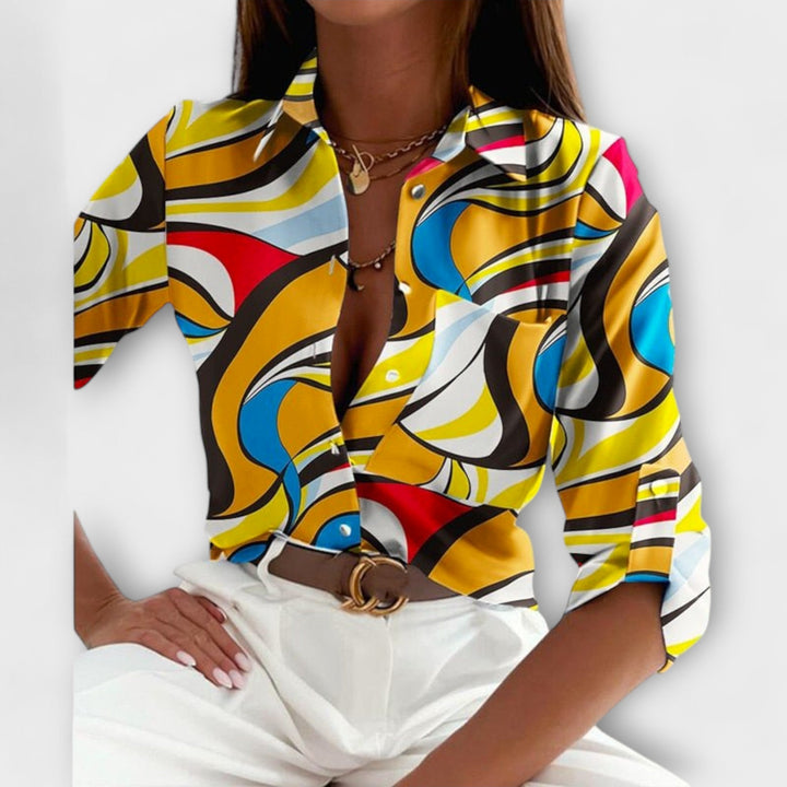 Chic women's long sleeve blouse with classic collar, versatile for elegant and casual styling.