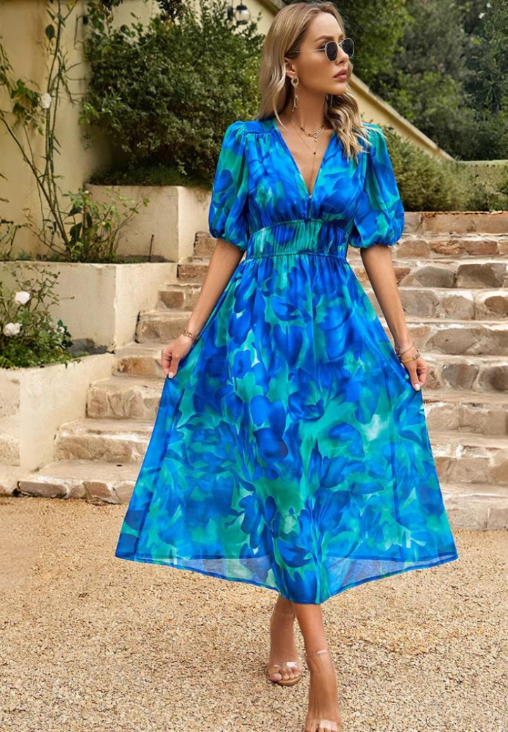 Casual yet chic Women's Floral Print Midi Dress with V-Neck, ideal for sunny days and comfort.