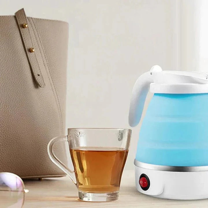 Durable TavvitaImp011 collapsible electric kettle, ideal for hot water at camping sites or outdoor adventures.