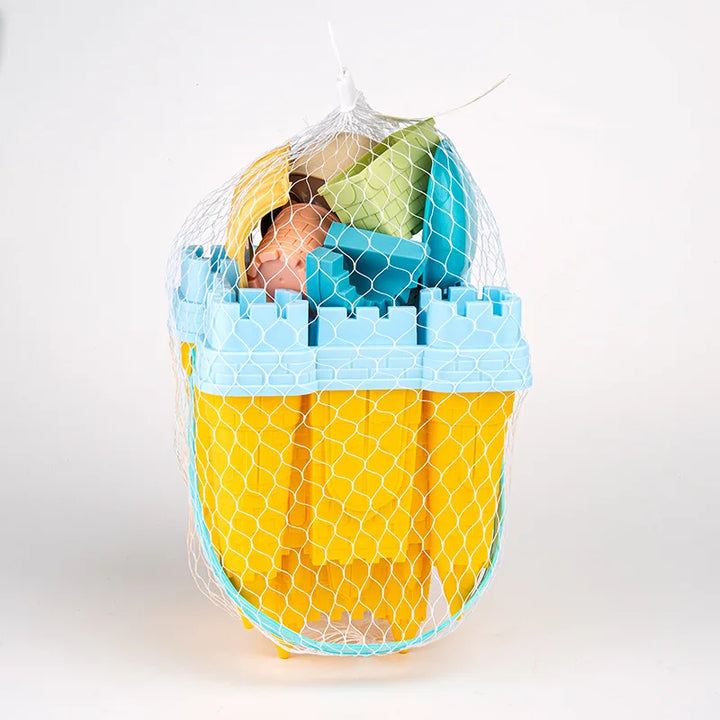 Children enjoying imaginative play with a sandcastle playset, building a detailed castle at the beach.