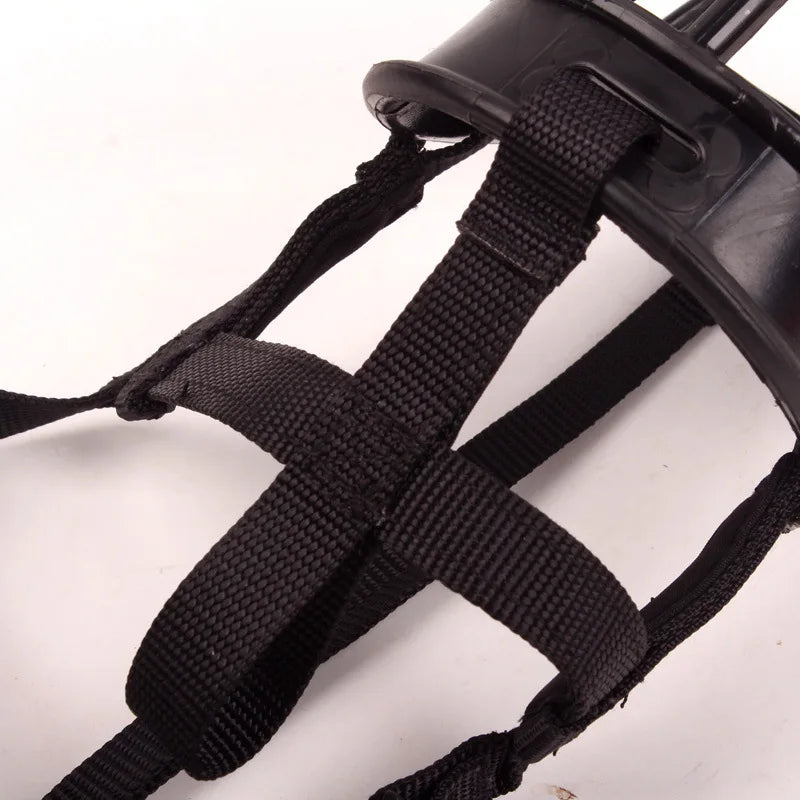 Adjustable silicone muzzle for dog training, promoting safety & preventing bites.