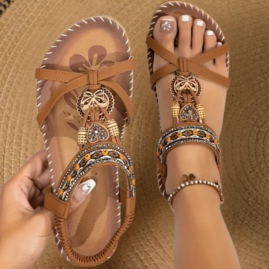 Simple & versatile flat T-strap sandals for women, offering comfort for all-day summer wear.