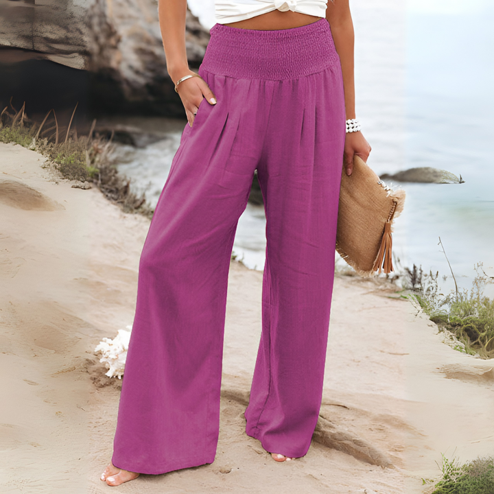 Comfortable women's high-waisted linen trousers, perfect for casual spring & summer style.