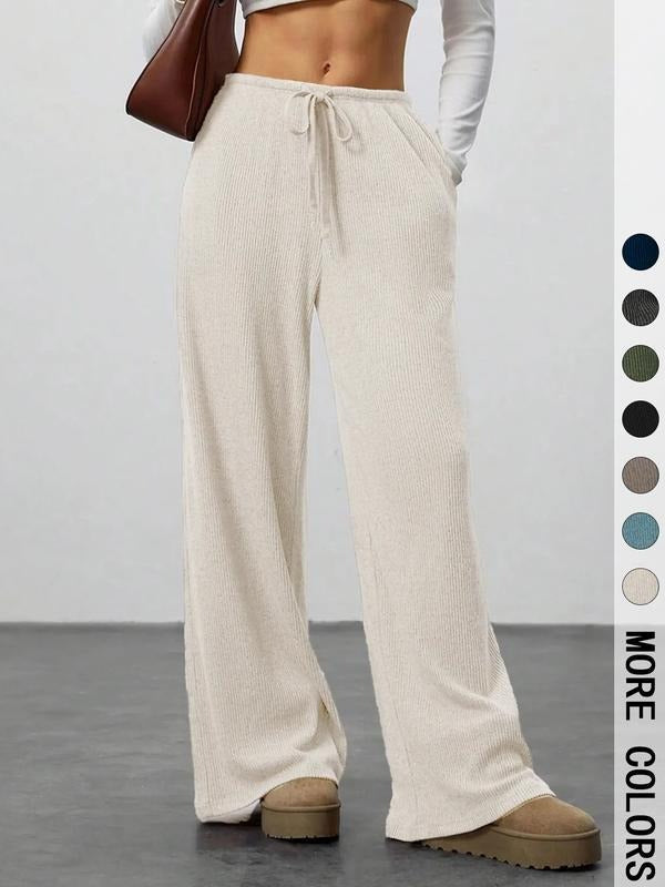 Soft women's ribbed lounge pants featuring a wide-leg design and drawstring waist for ultimate comfort.