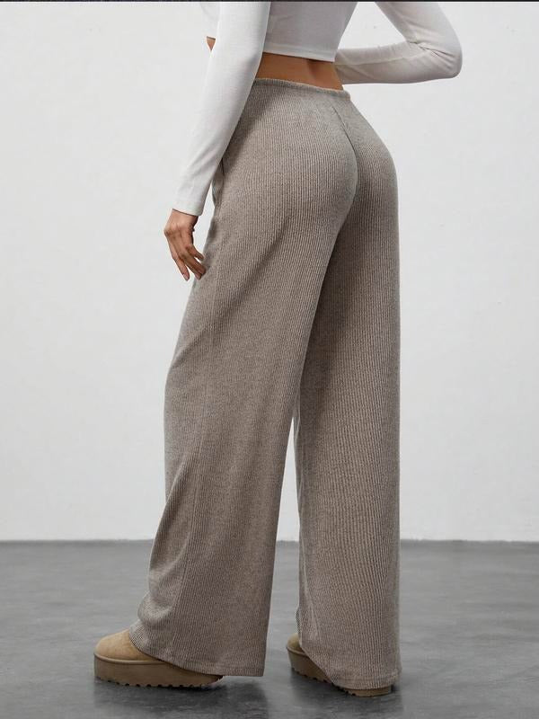Relaxed fit women's ribbed wide-leg pants, perfect for lounging or everyday casual wear, in a soft knit.