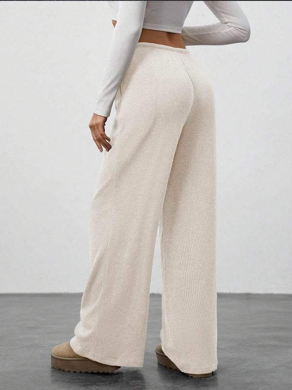 Stylish women's ribbed wide-leg lounge pants with a comfortable drawstring waist, great for chic comfort.