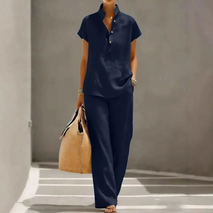 Stylish women's short sleeve two-piece matching set with wide leg pants, ideal for casual summer outfits.