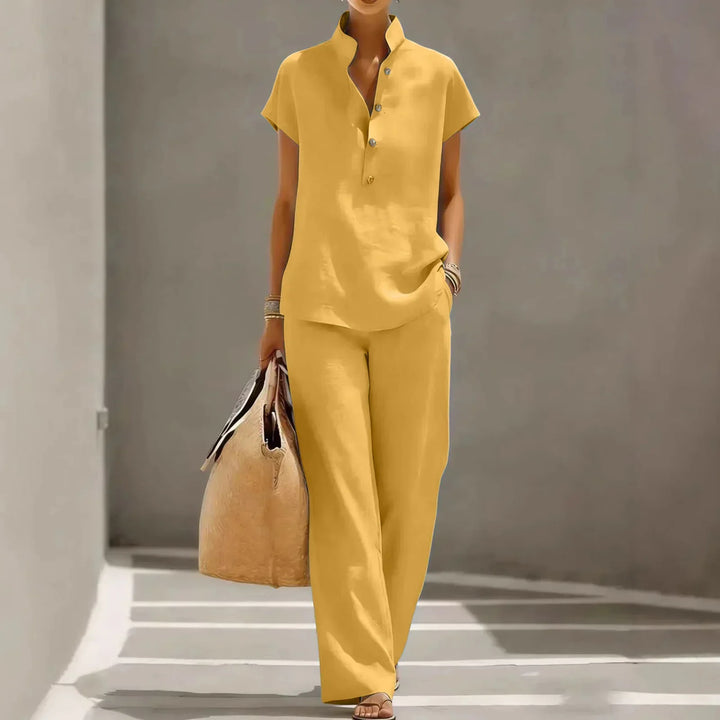 Women's short sleeve two-piece lounge set, a comfortable matching outfit with wide leg pants for casual wear.
