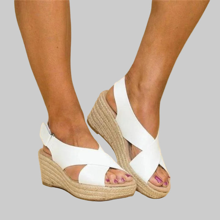 Stylish women's espadrille wedges. Comfortable open-toe sandals, ideal for everyday summer wear and vacation outfits.