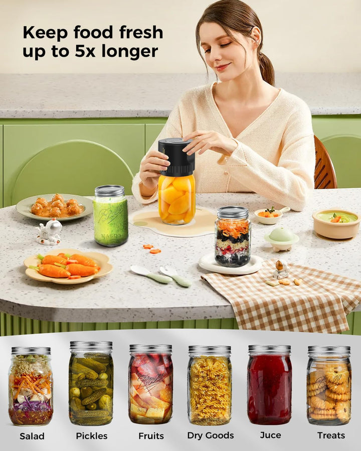 "Compact portable electric vacuum sealer kit, black, cordless, fits Mason jars, ideal for kitchen food preservation."