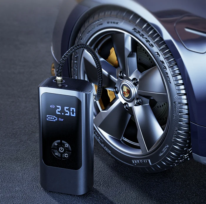 Digital display portable tire inflator, dual power & cordless, ideal car accessory for emergencies.