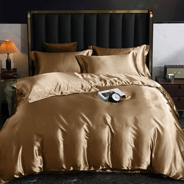 Cooling double-sided satin bed sheet set for luxurious comfort. Includes quilt cover & pillowcases for a stylish bedroom.